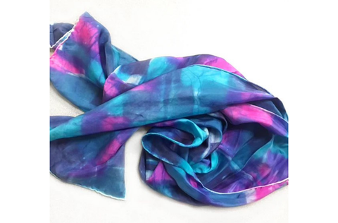 A blue and pink silk scarf.png