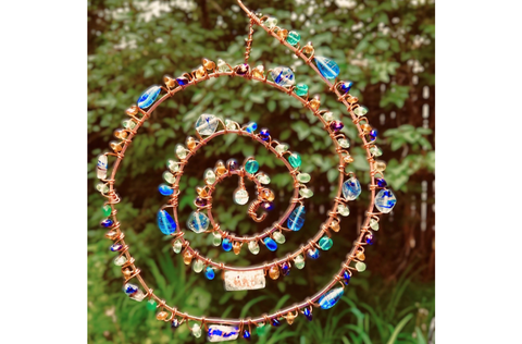 A beaded wire suncatcher.png