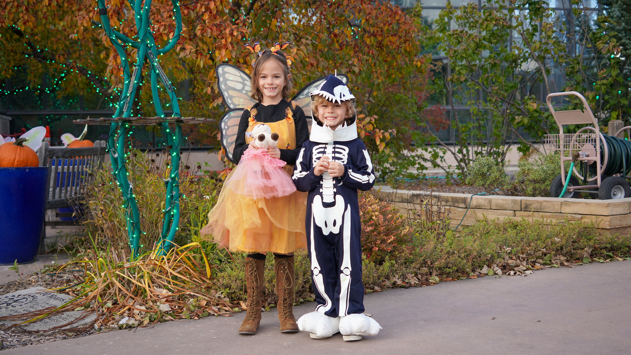 children in costumes (fairy and skeleton)